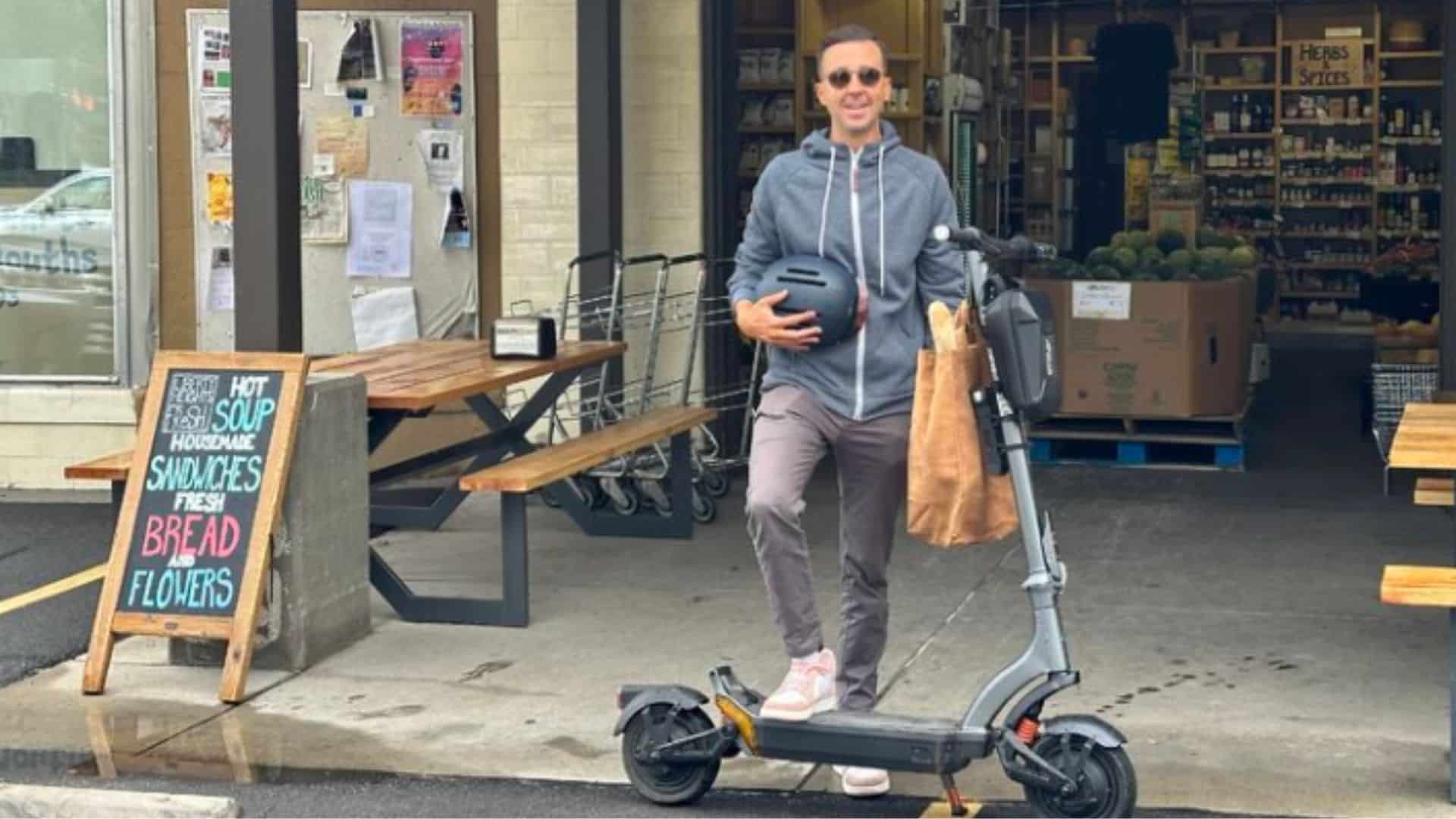 Ryan and electric scooter Ryan Westwood on electric scooter